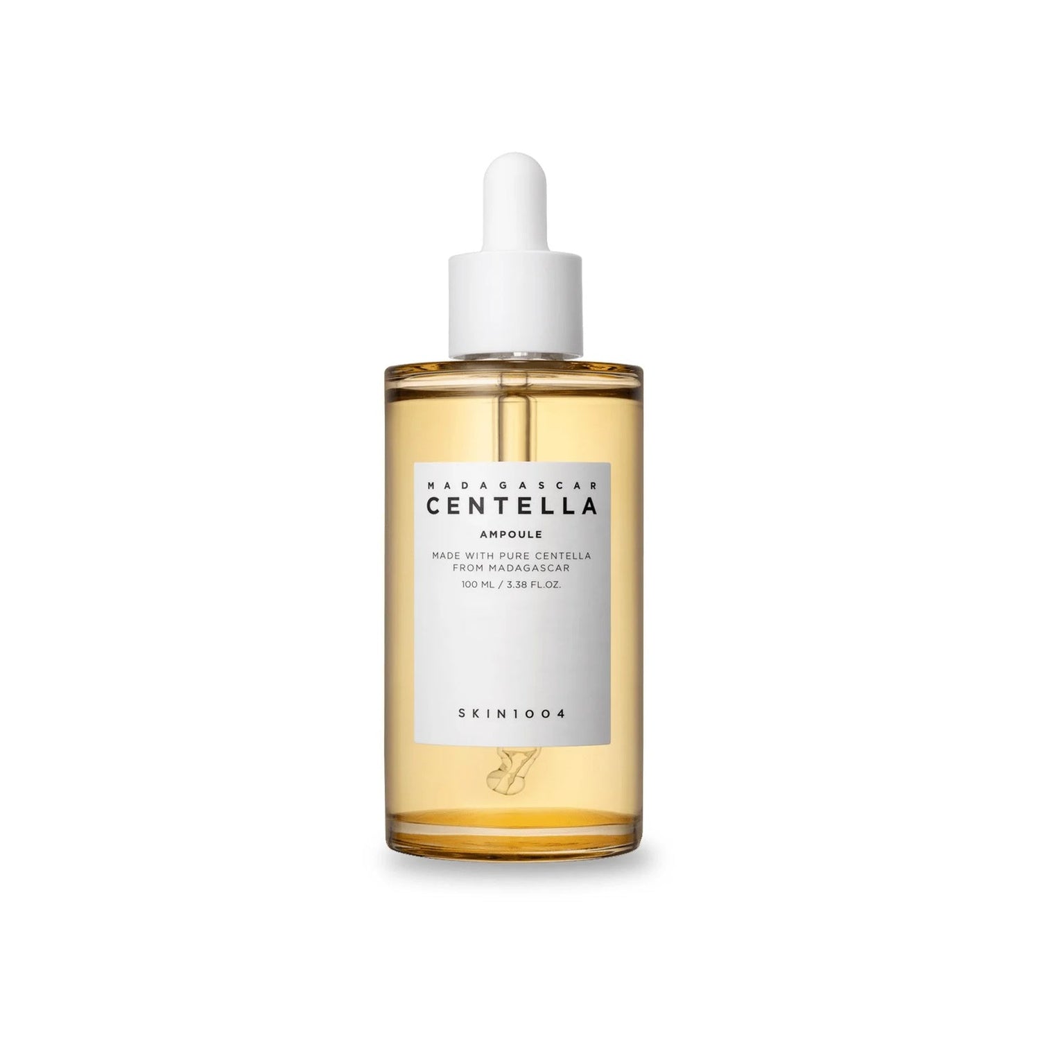 SKIN1004 Madagascar Centella Ampoule — frasco de vidro âmbar com conta-gotas sobre fundo branco