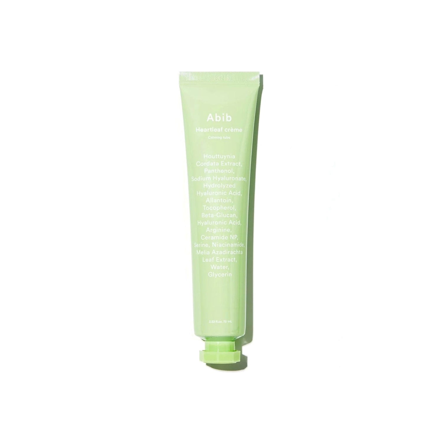 Abib Heartleaf Crème Calming Tube — bisnaga verde do creme facial sobre fundo branco